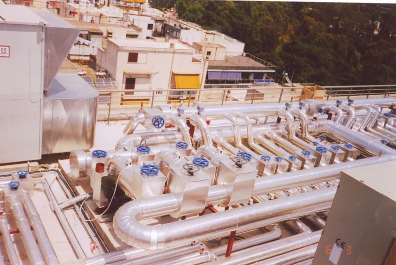 Air conditioning pipework with cladding